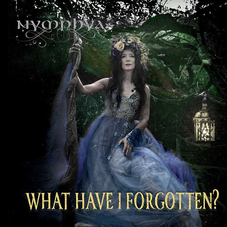 What Have I Forgotten? album cover: Nymphya in a blue gown in a dark forest